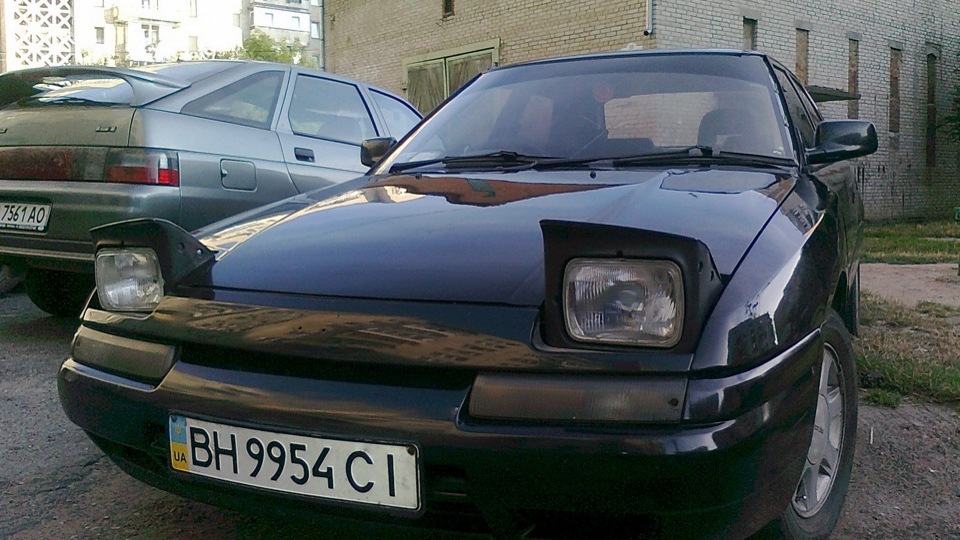 Mazda Astina: 6 фото